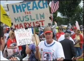 Impeach the Muslim sign carrier