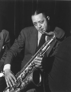 Lester Young on tenor displaying that unusual way of holding his instrument.