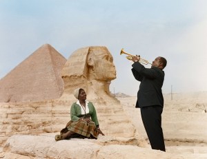 Colorized version of famous black and white photo of Pops playing for Lucille and the Sphinx, 1961—© Bettmann/Corbis photo 