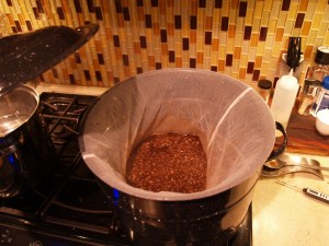 Grains in nylon bag suspended in mash water.